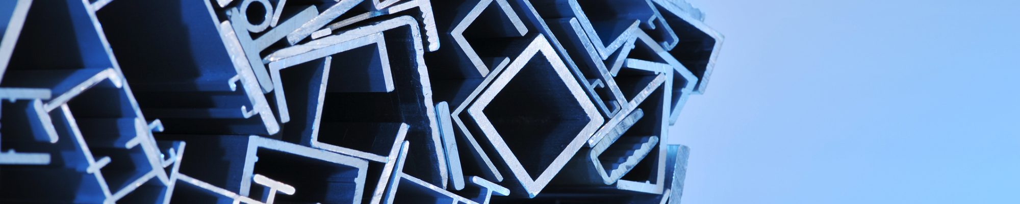 many different aluminum sectional strips in blue spotlight